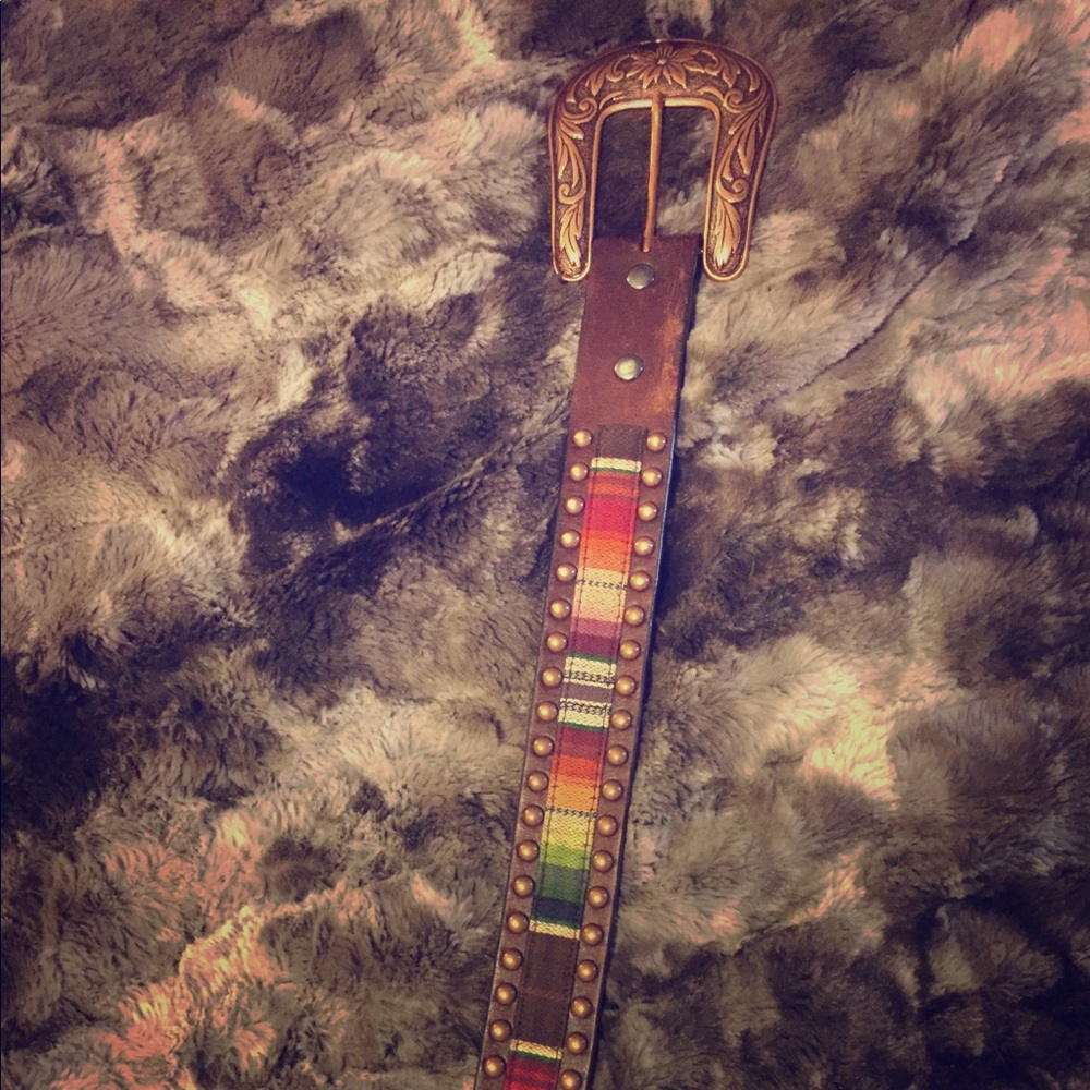 Ariat belt- one hole punched into pattern